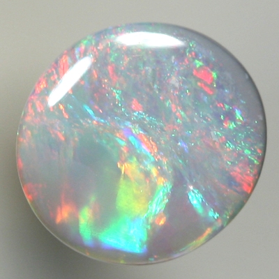 SOLID SEMI BLACK OPAL Pretty opal, reds to purple to green to red